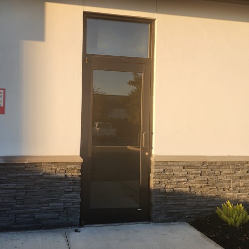 insulated glass door panel replacement at bank entry in Lake County FL. Click to open in modal.