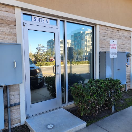 Winter Park office lobby glass door upgraded to clear safety glass. Click to open in modal.