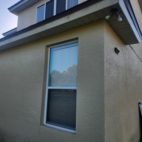 Tilt-in double-hung window in Winter Springs sitting level after balance and shoe replacement. Click to open in modal.