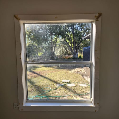 Older aluminum window in Casselberry with new glass and repaired balances. Click to open in modal.