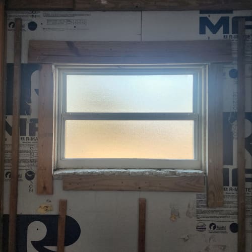 Bathroom window in Kissimmee with new frosted privacy glass. Click to open in modal.