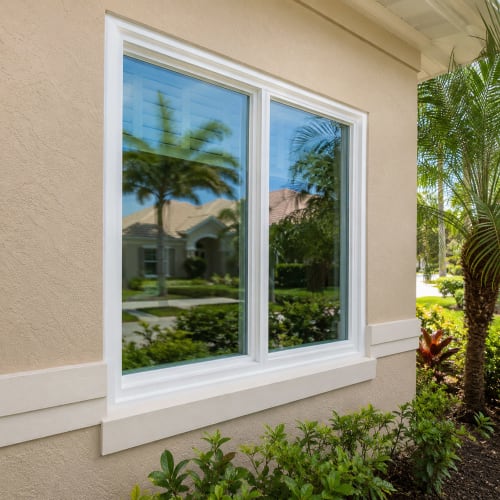 Impact-resistant window glass installed in a Clermont home after replacement. Click to open in modal.