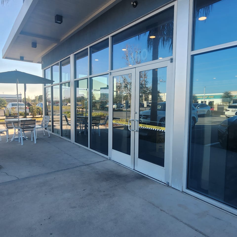 glass orlando technician answering commercial door closer and hinge questions for business owner in Orlando FL