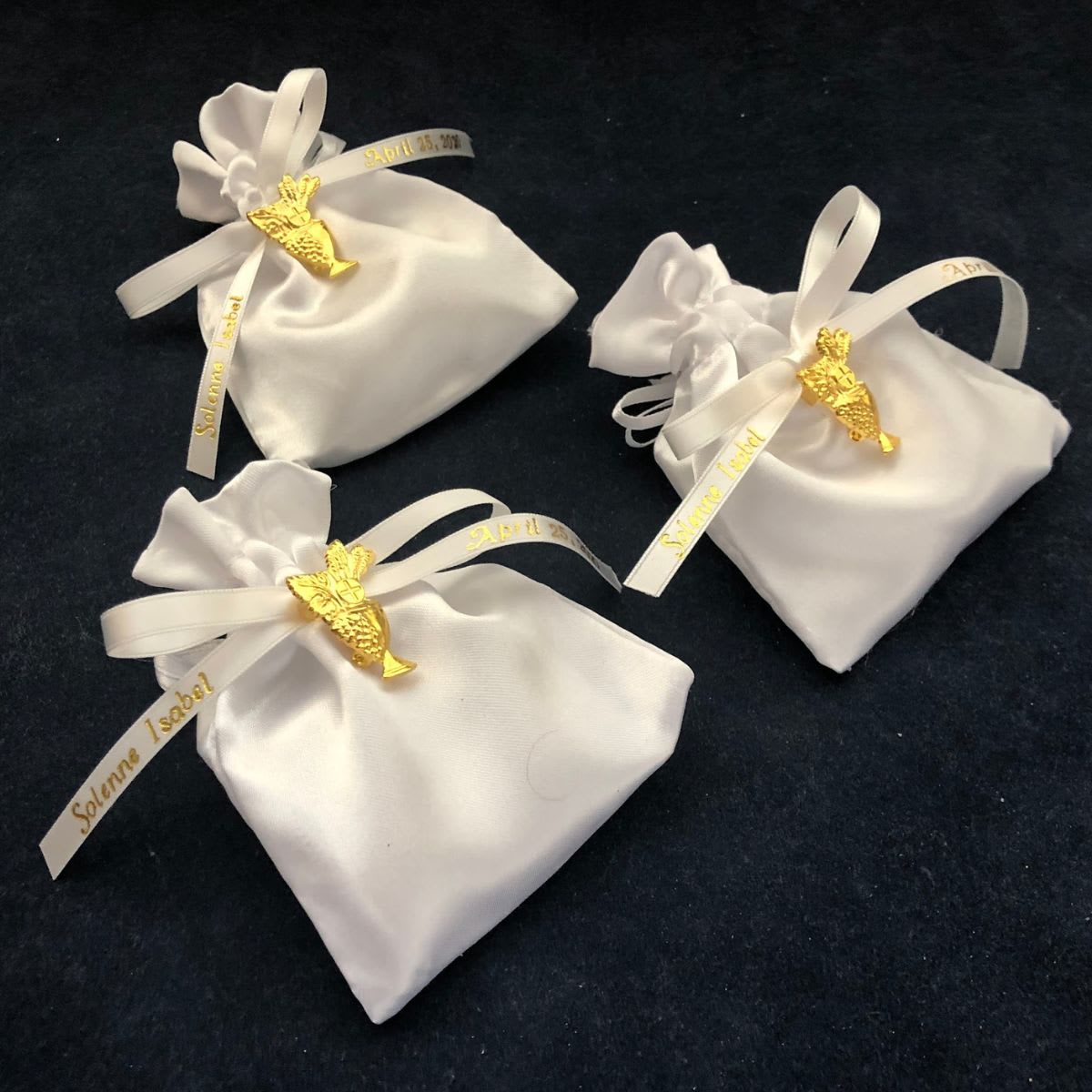 First Communion satin pouches with chalice pin.