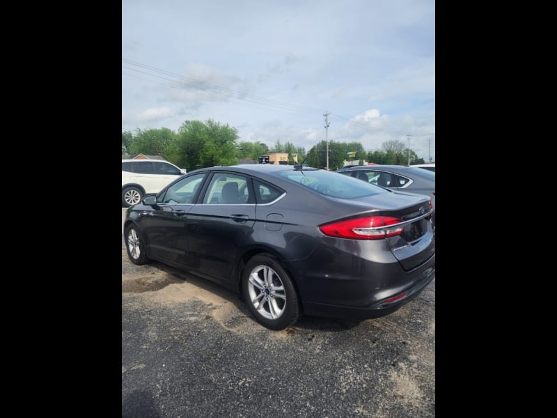 Ford Fusion 2018 price $14,999