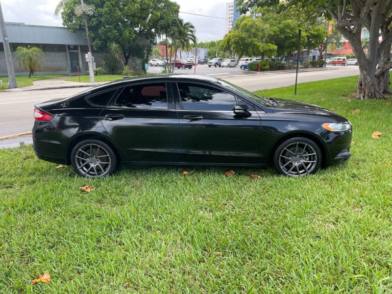 Ford Fusion 2013 price $2,099