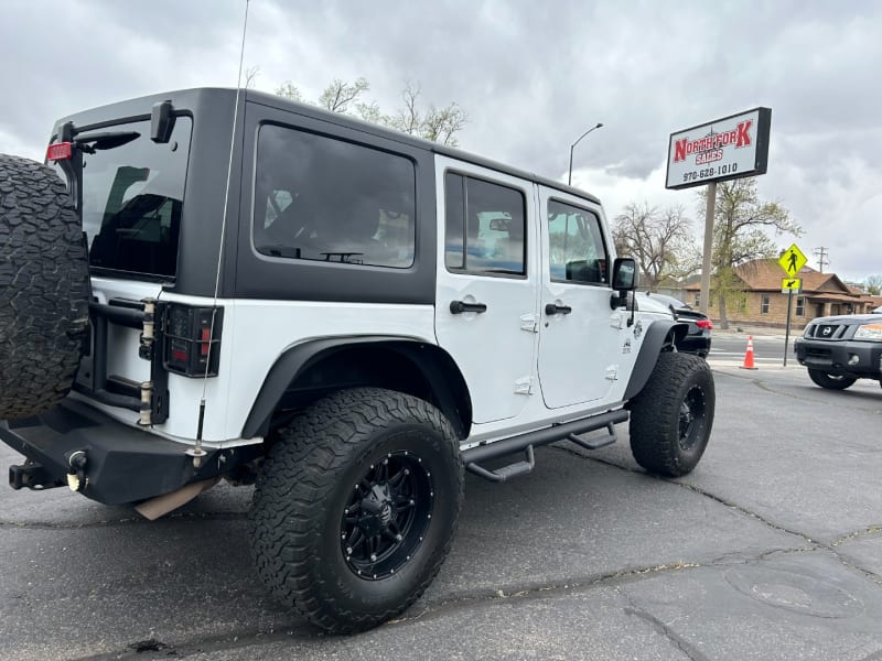 Jeep Wrangler Unlimited 2014 price $21,000