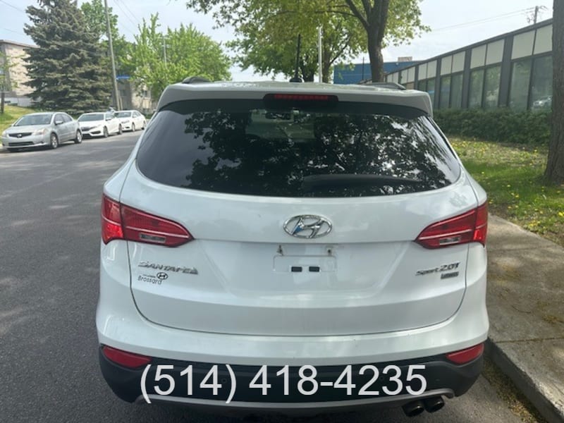 Hyundai Santa Fe 2013 price $12,998