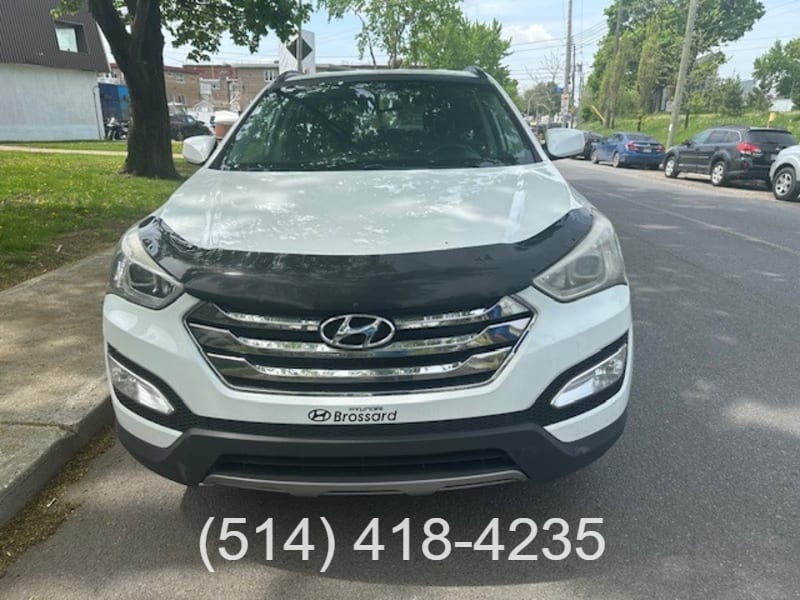 Hyundai Santa Fe 2013 price $12,998