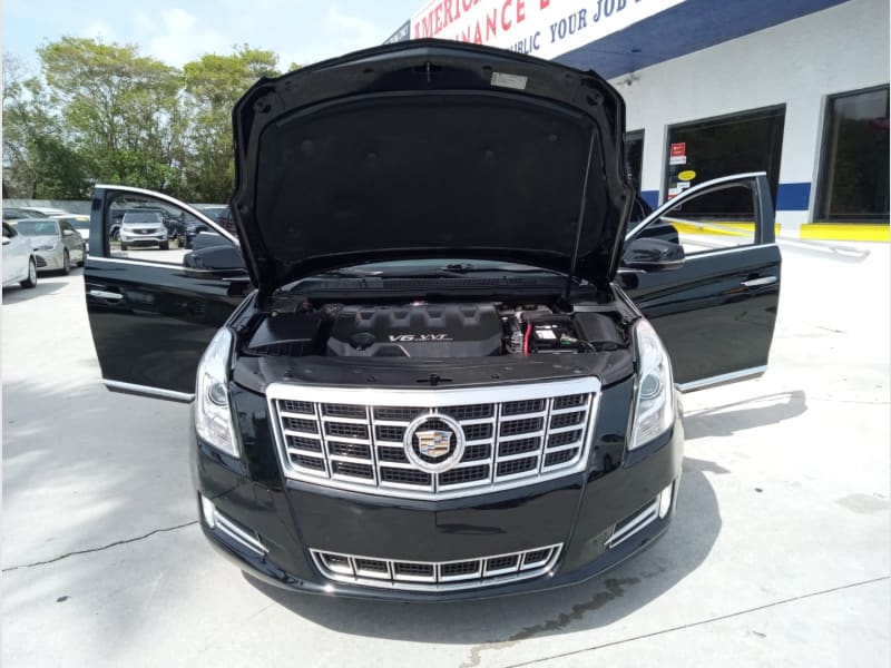 Cadillac XTS 2013 price $11,995