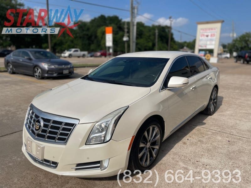 Cadillac XTS 2013 price $12,900