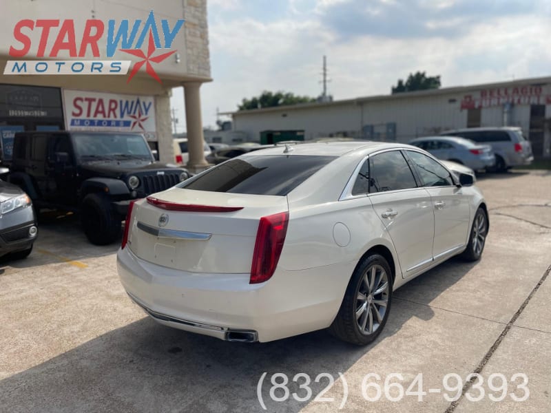 Cadillac XTS 2013 price $12,900