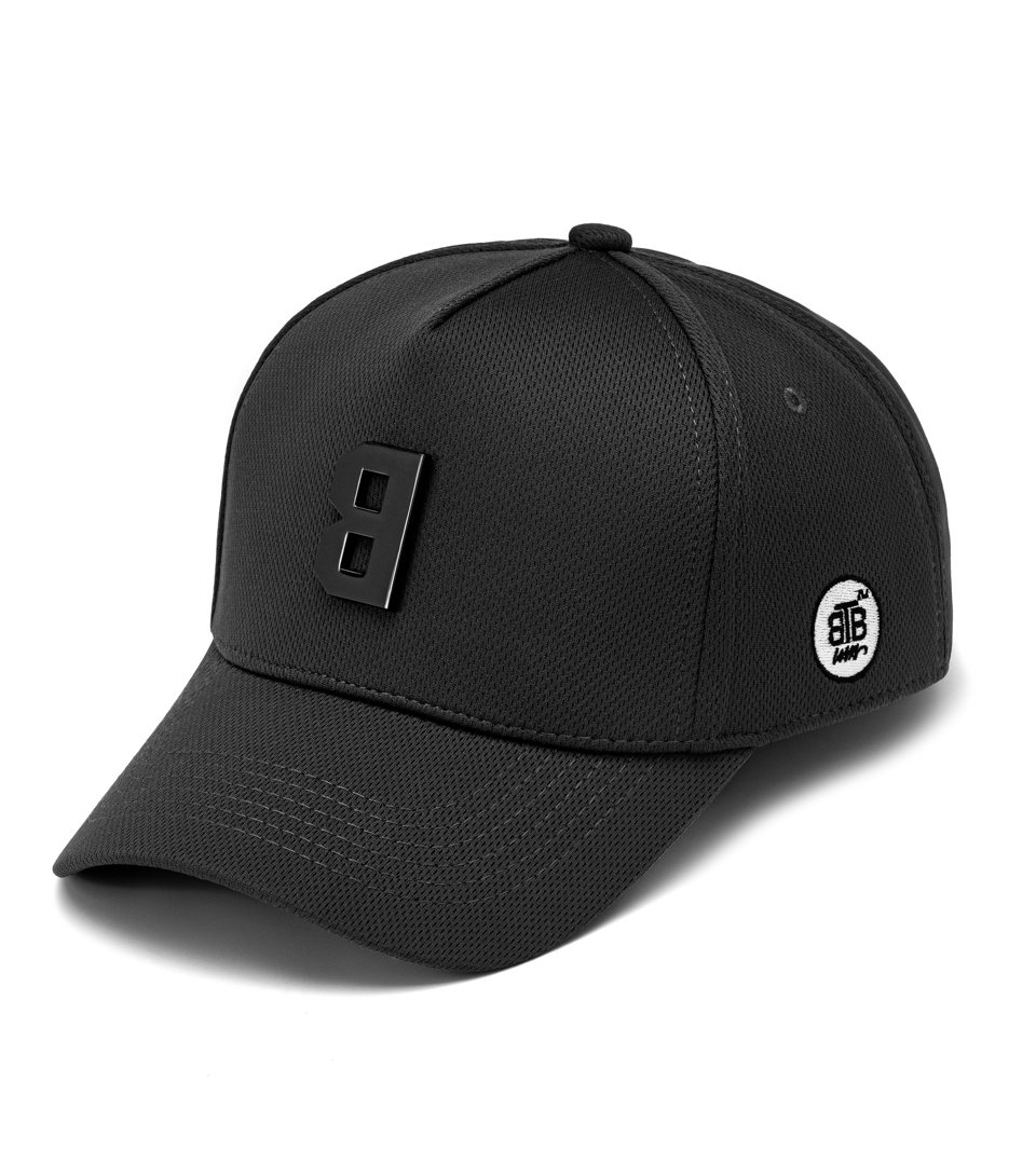 Snapback cap with flame embroidery placed next to the tee