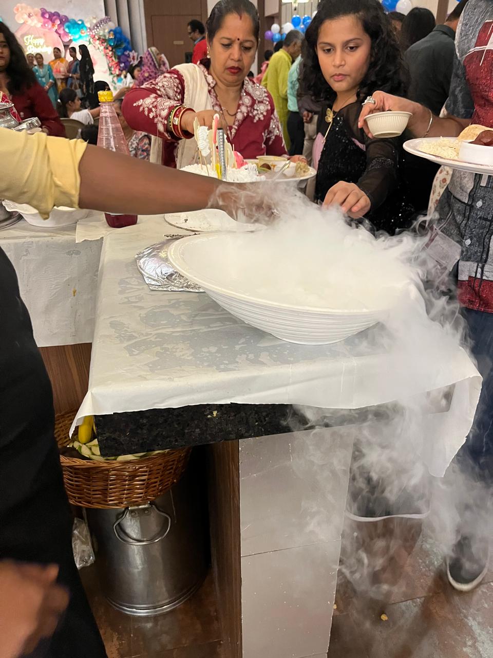 Guests being served at the malai kulfi and falooda counter during the birthday celebration