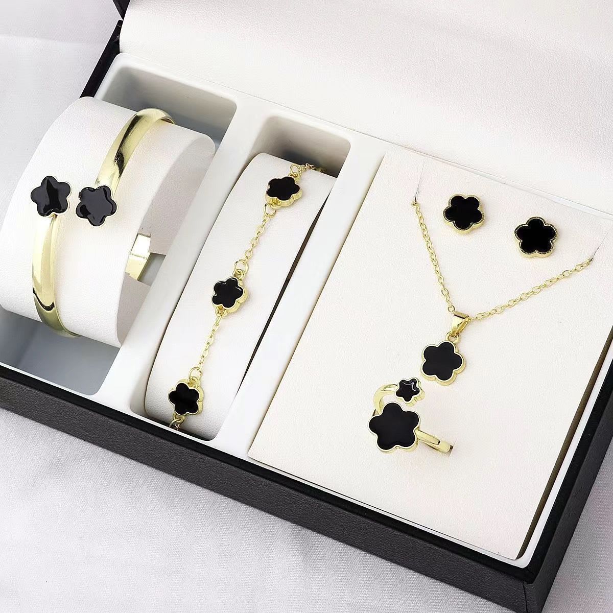 Parure bijoux trèfle à 4 feuilles - Collier, bracelet, boucles & bague