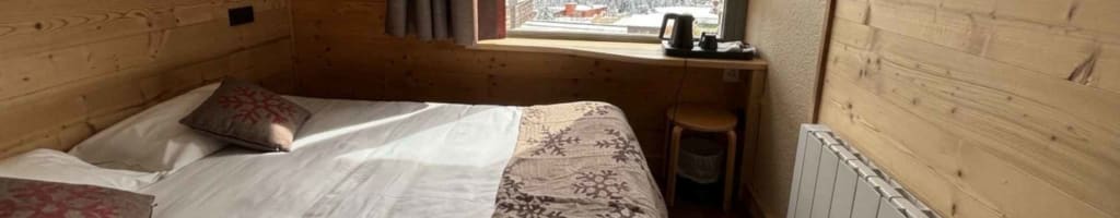 Arc en Ciel - chambre double - vacances au ski - savoie en hiver