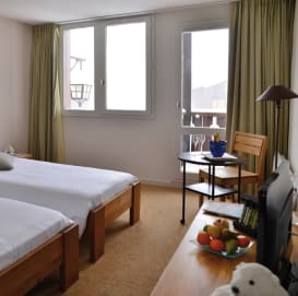 Vue d'ensemble Chambre confort 4 personnes, côté pistes