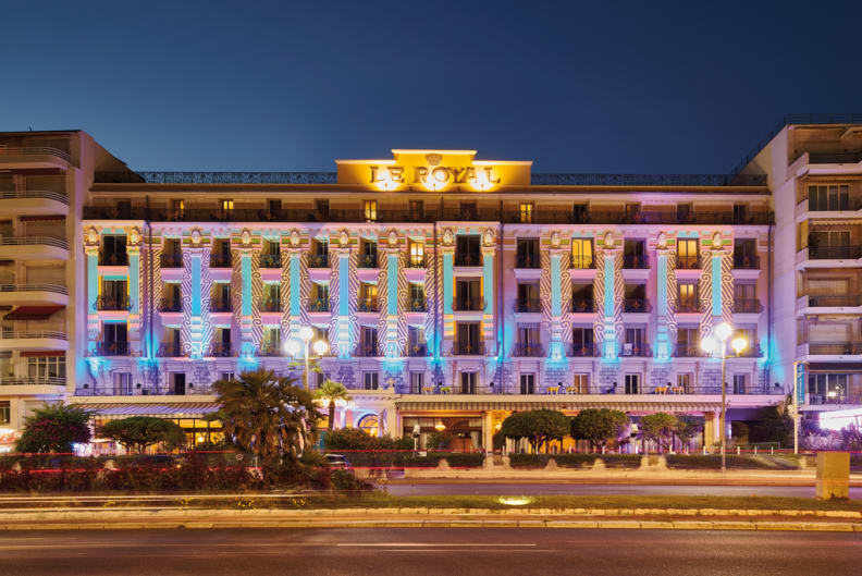 Le Royal*** facade by night