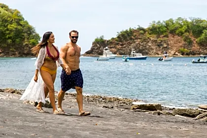 coco-bay-ocotal-beach-couple-walk.jpg