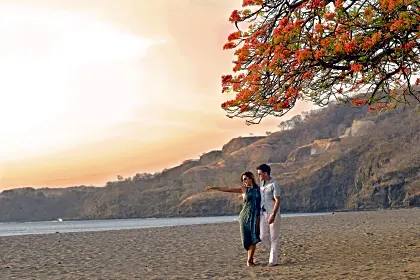coco-beach-walking-couple.jpg