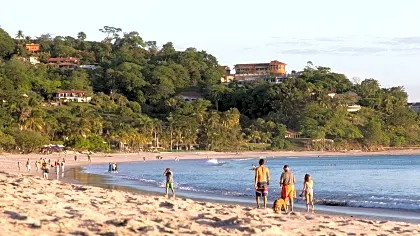 flamingo-beach-tourist-swimming.jpg