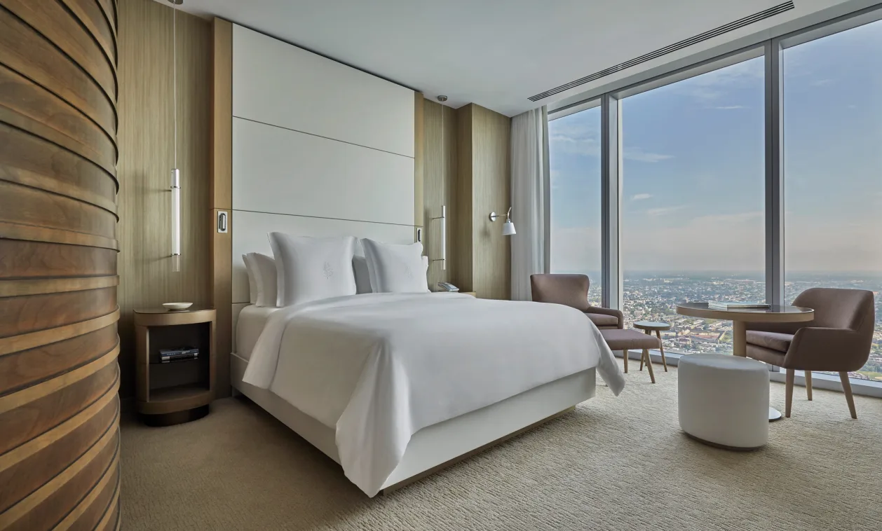 bed and view of city from room in four seasons philadelphia