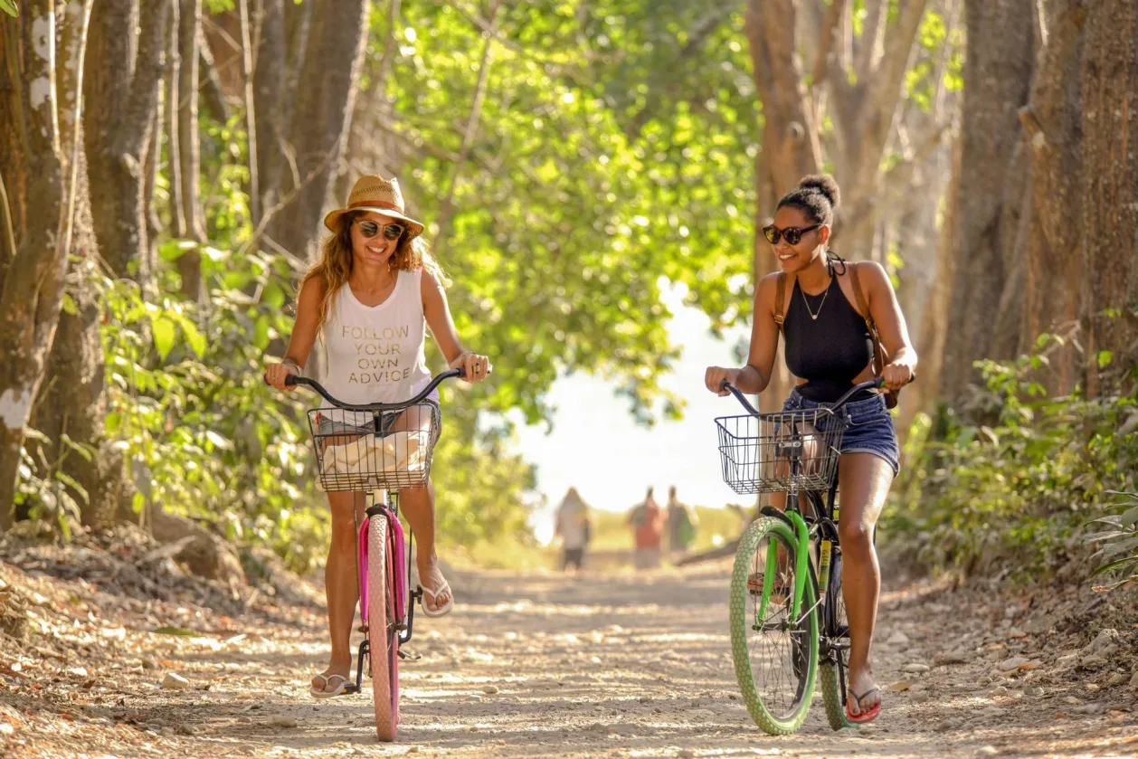 casa-chameleon-mal-pais-two women biking-best wellness retreats in costa rica