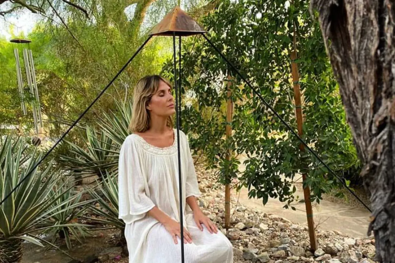 woman meditating at Palm Springs spa resort We Care Spa