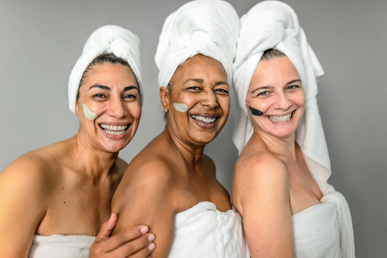 happy multiracial mature woman menopause retreat
