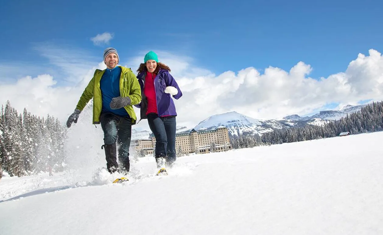 Fairmont Chateau Lake Louise couple snowshoeing