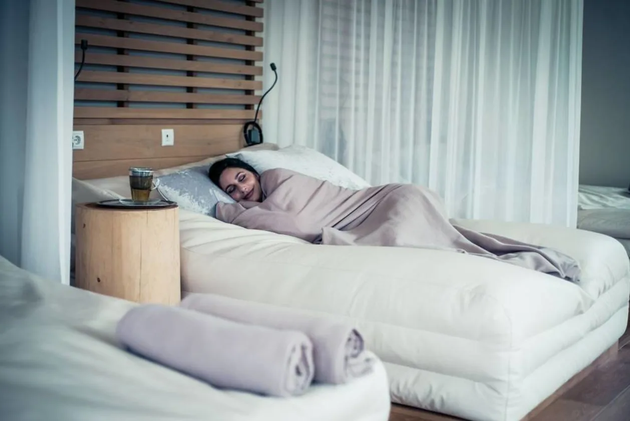 Female guest in relaxation room at Preidlhof