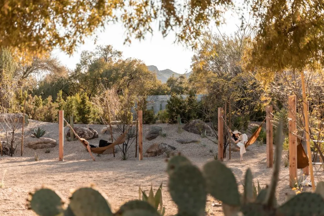 Guest in hammocks in reflective garden at CIVANA Wellness Resort