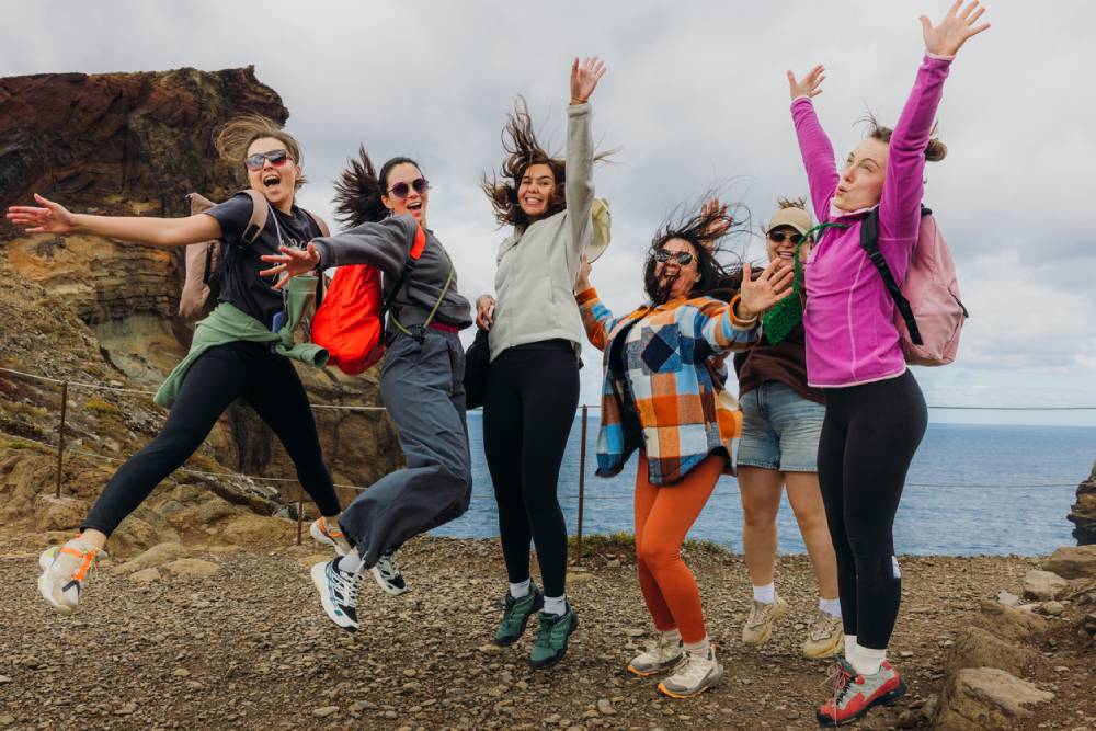 Group of women hikers having fun together