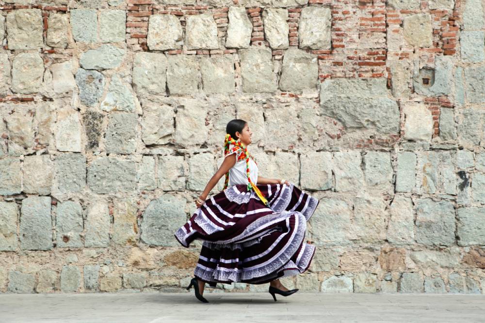 Young woman in traditional dress Oaxaca Mexico