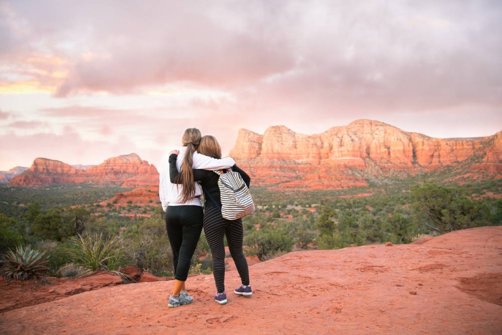 Mother-daughter hug while hiking Sedona