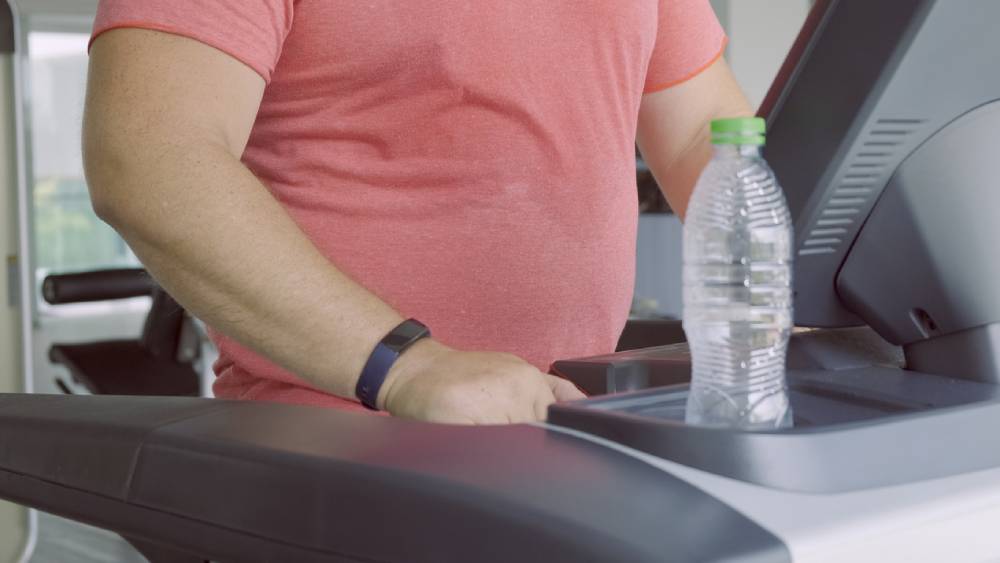 Overweight man on treadmill