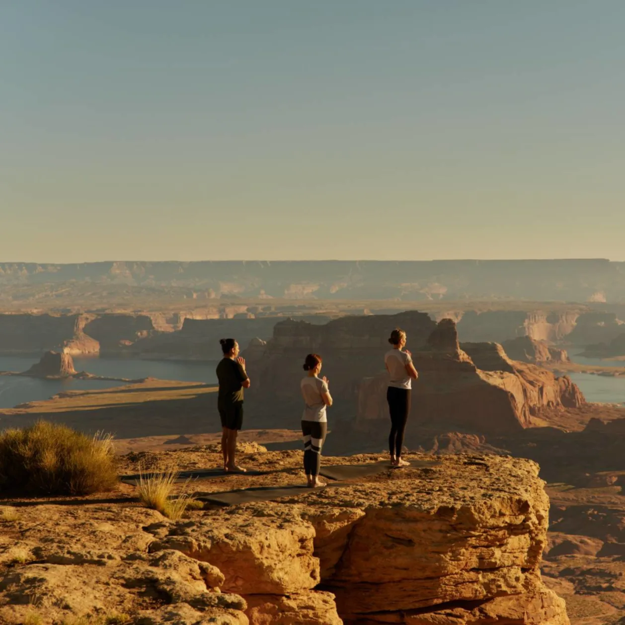 Morning yoga on tower butte at Amangiri