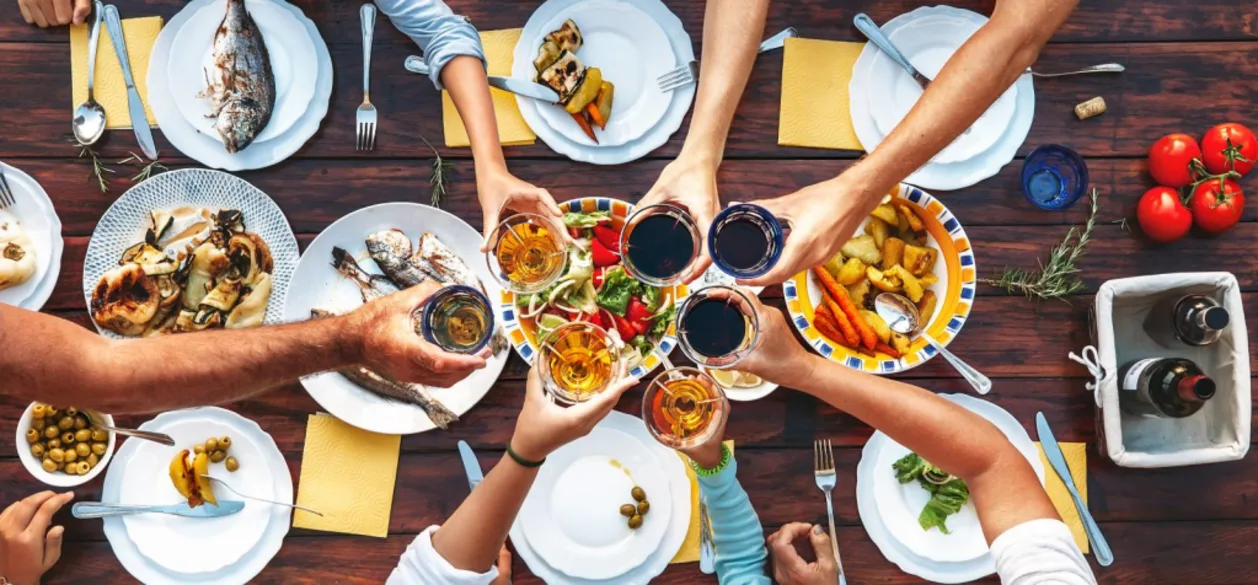 Group of friends eating dinner in Croatia