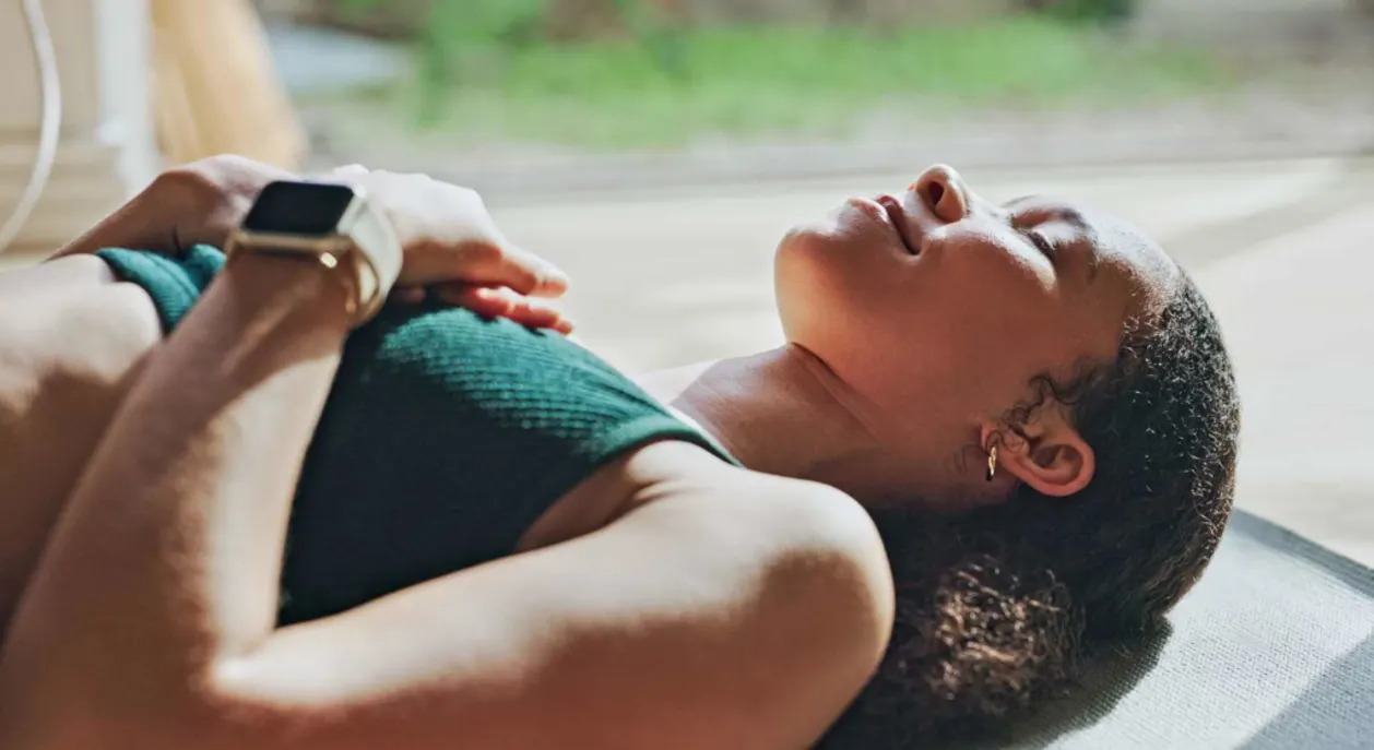 african american athlete practicing meditation visualization on mat