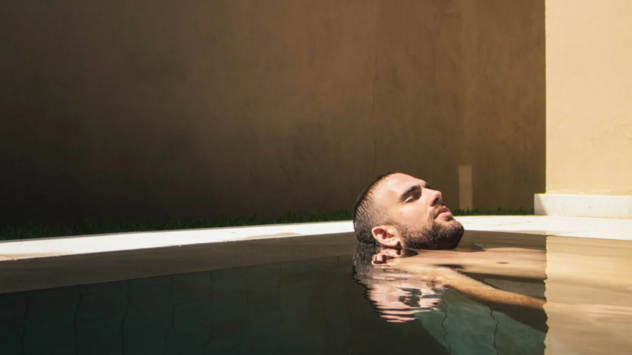 Spas are for men and man relaxing in pool