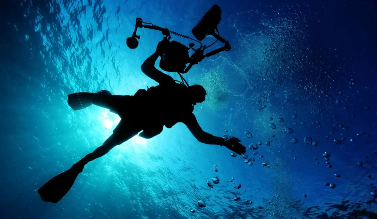 scuba diver using equipment