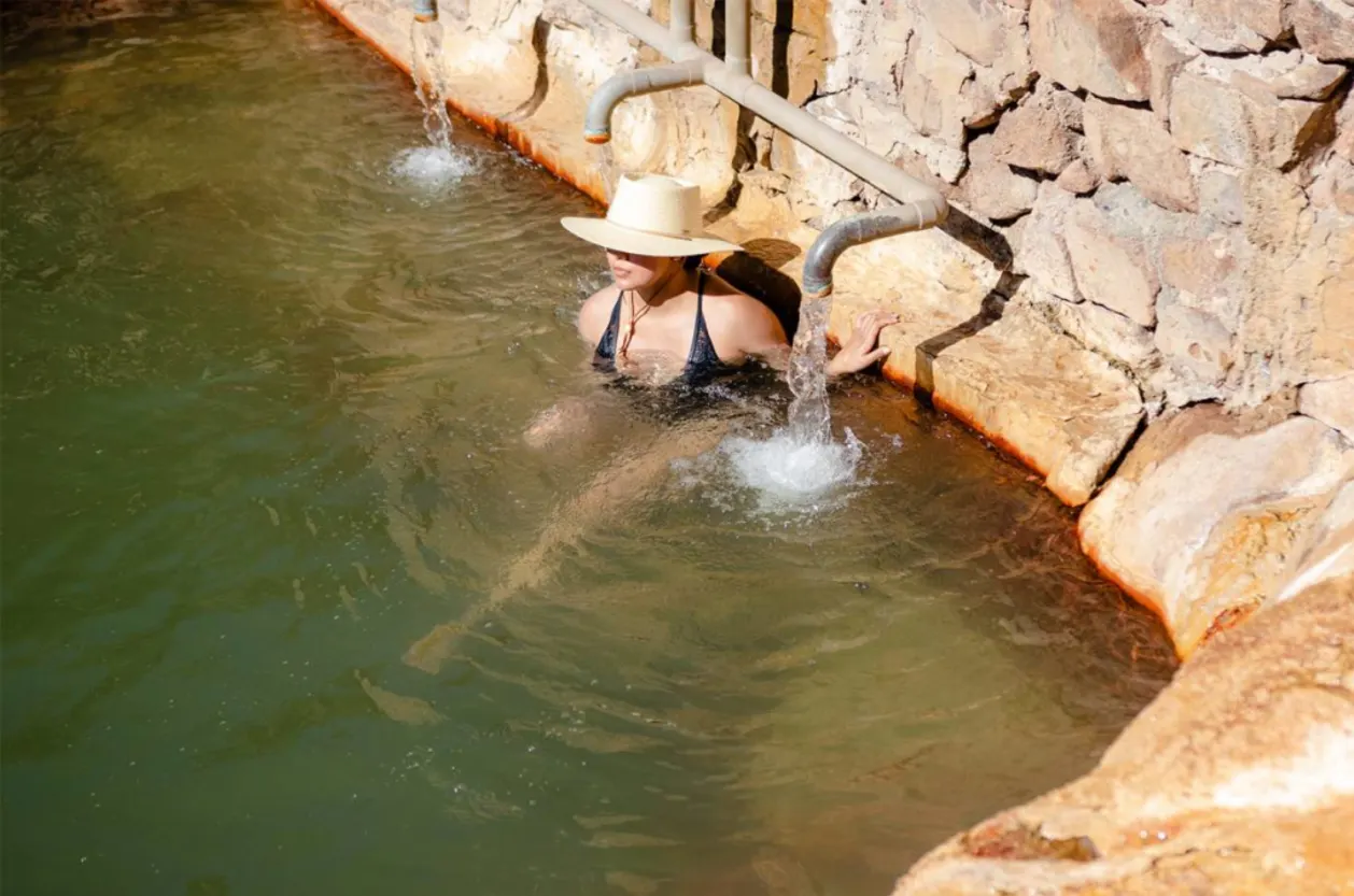 Guest in mineral pool at Ojo Caliente Resort