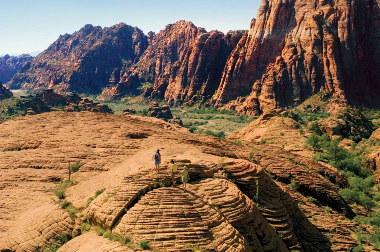 Guests hiking Snow Canyon at Red Mountain Resort