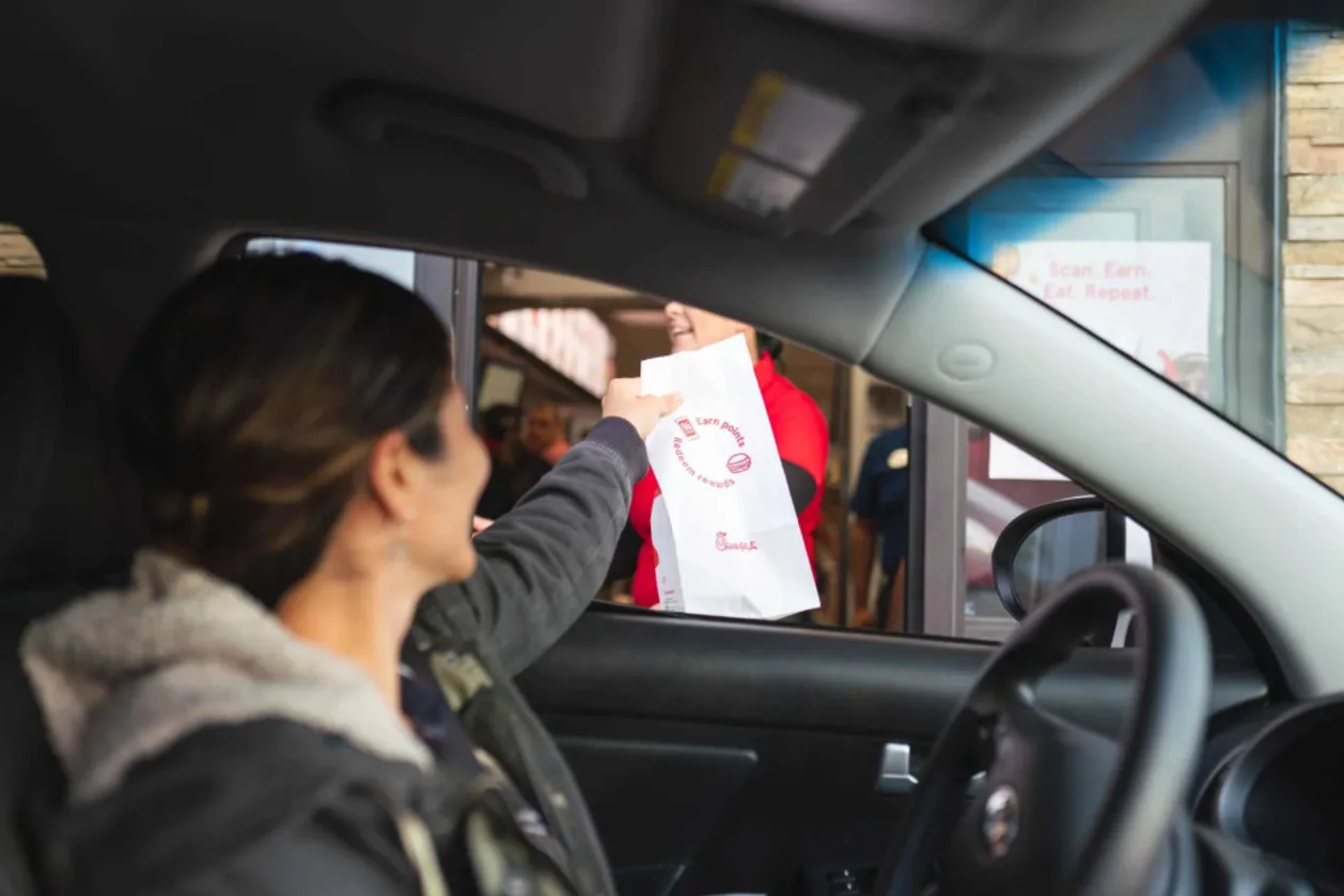 woman at drive-through counter