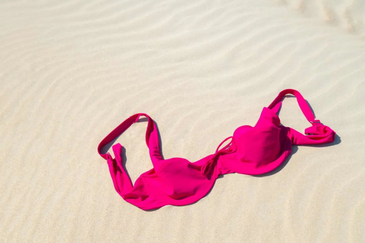 close up of biking top on nude beach