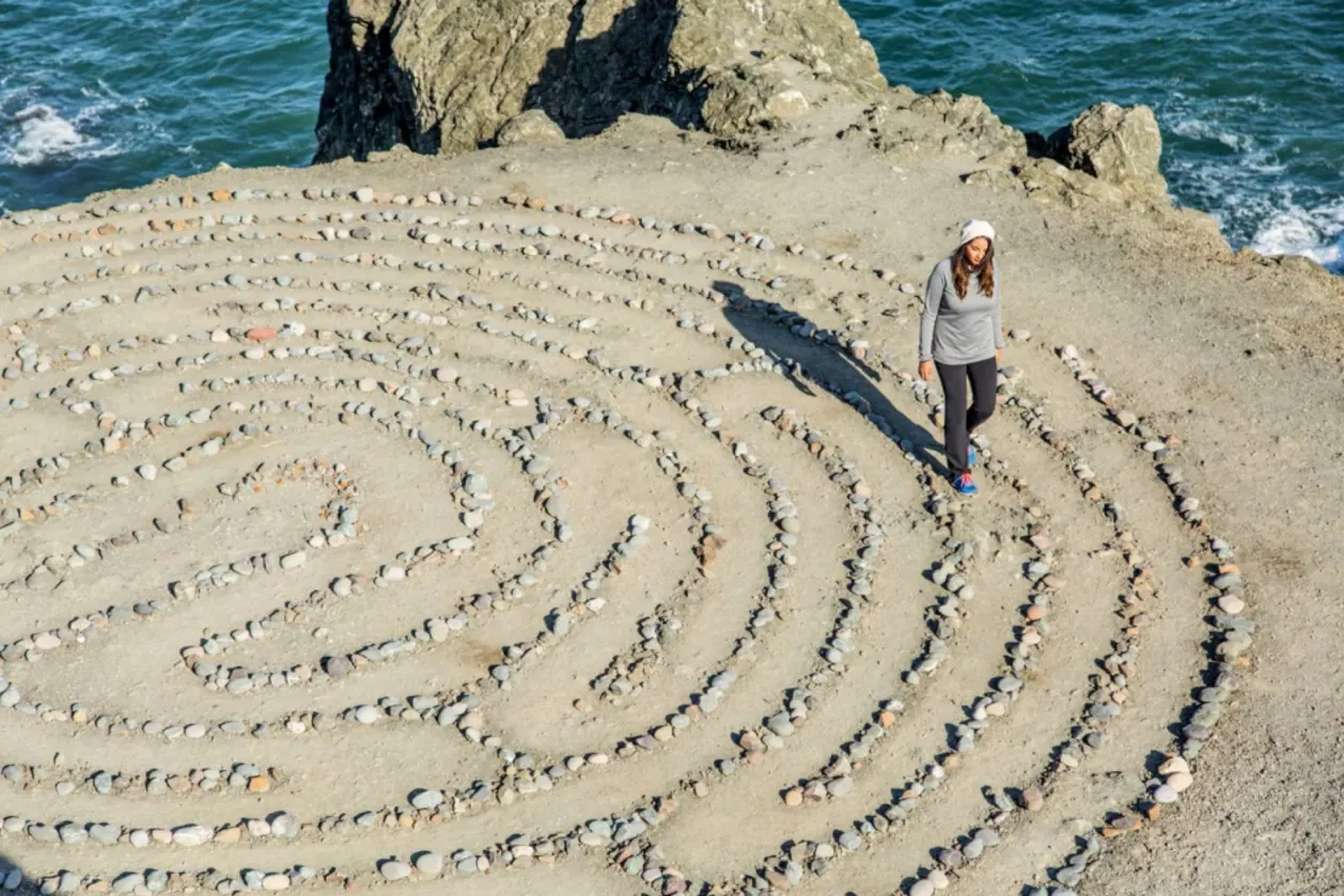 woman mindful walking lands end labyrinth