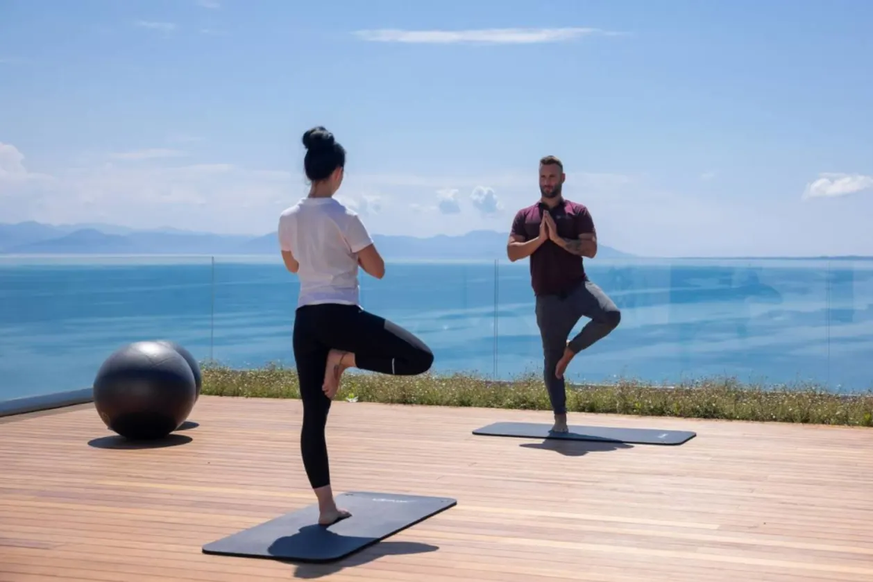 Yoga on spa deck Angsana Corfu Resort in Greece