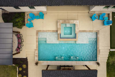 Timeless Elegance Meets Daily Escape in Fort Worth — pebble plaster & cool-deck surfacing — Fort Worth, TX