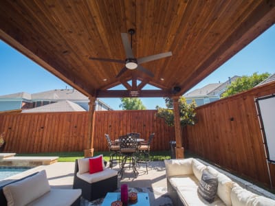 Establishing overview of a complete outdoor living space crafted by Selah Pools for the Chambers residence in Grand Prairie, Dallas County, TX.
