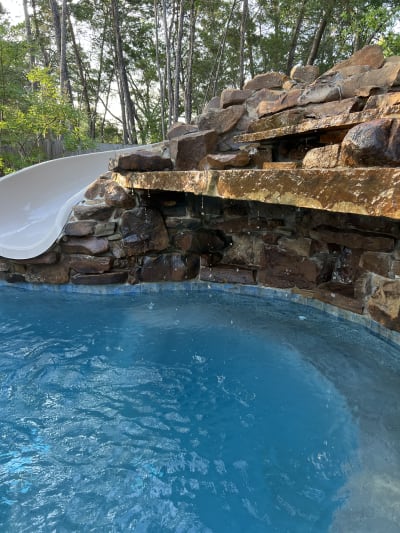 Luxury pool and attached spa at the Colon Residence in Santa Rosa Beach, FL, designed for seamless indoor-outdoor living.